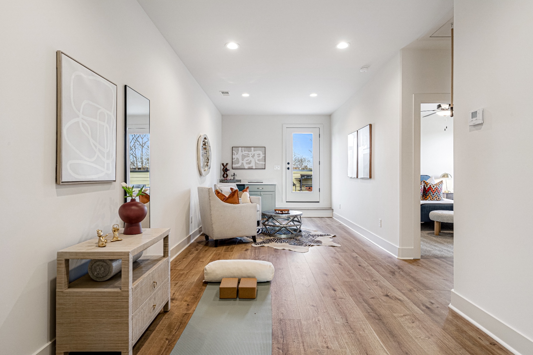 Upper landing with yoga nook and rooftop terrace doors
